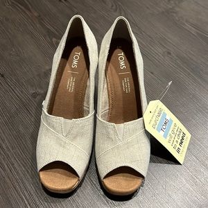 TOMS cork wedge heel, size 8, never worn.  Still has original tags. Original box